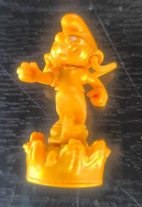 Figurka kinder złote Smerfy ZŁOTY Smerf biegacz