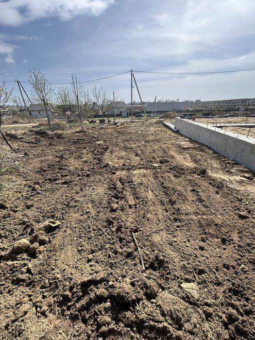 Вирівнювання ділянок підсипка засипка планування