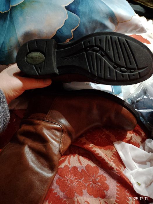 Botas de cano alto em pele