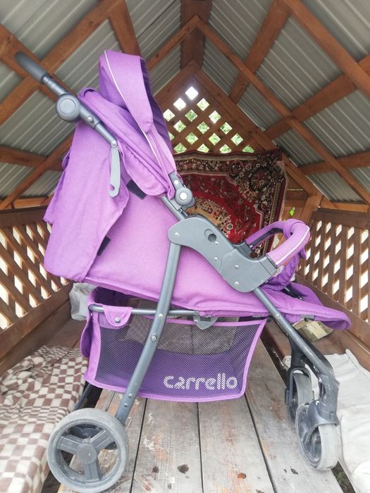 Дитяча прогулочная коляска