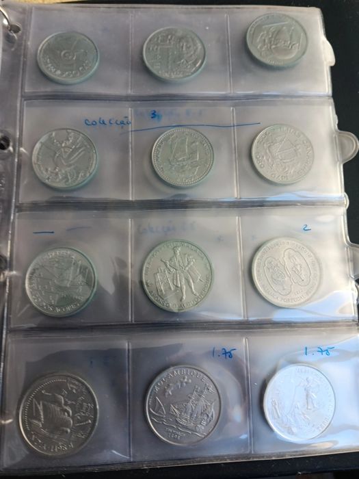 570 moedas diversas,1 álbum e 28 folhas