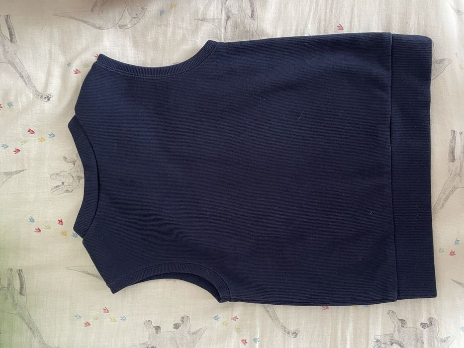 Нова дитяча жилетка