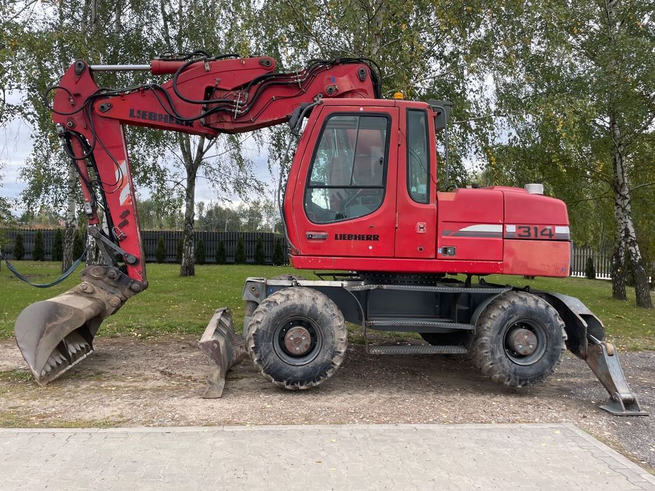 Liebherr A314 Litronic  Klima, Centralne smarowanie, pompka paliwa, podpory