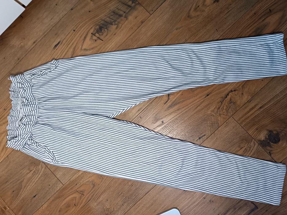Eleganckie spodnie w paski 128 białe C&A