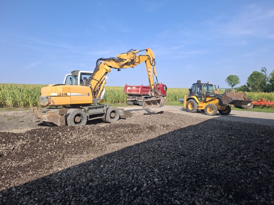 Koparka CASE WX120 Liebherr 314