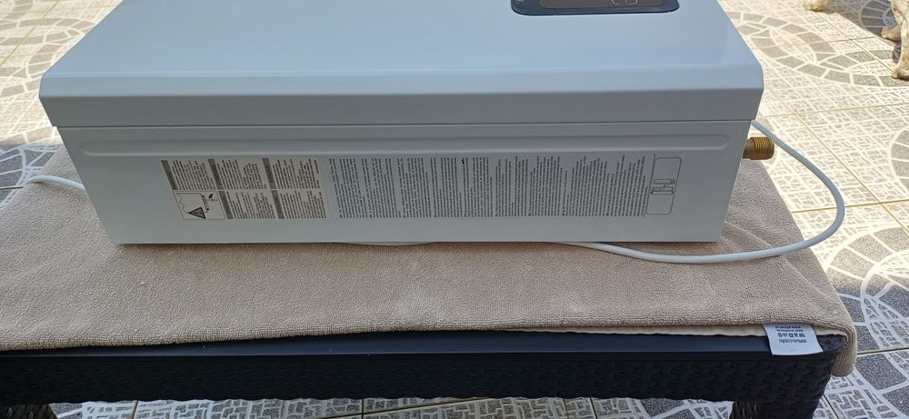 Esquentador a Gás Ariston e 2 garrafas de gás Grandes.