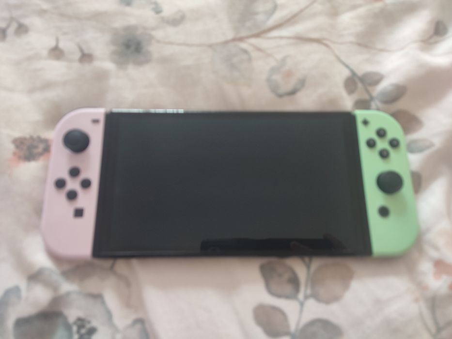 Nintendo switch OLED z 4 joykonami z torbą na Nintendo