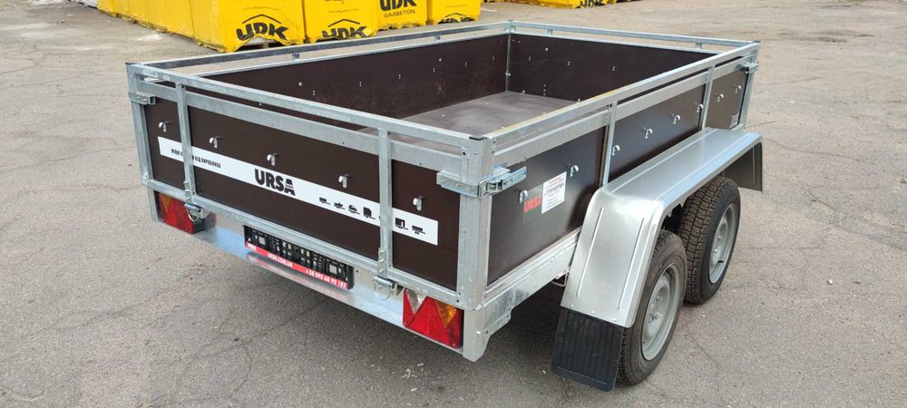 Прицеп двух осник, две оси, усиленный бортовой, оцинкованный Ursa,