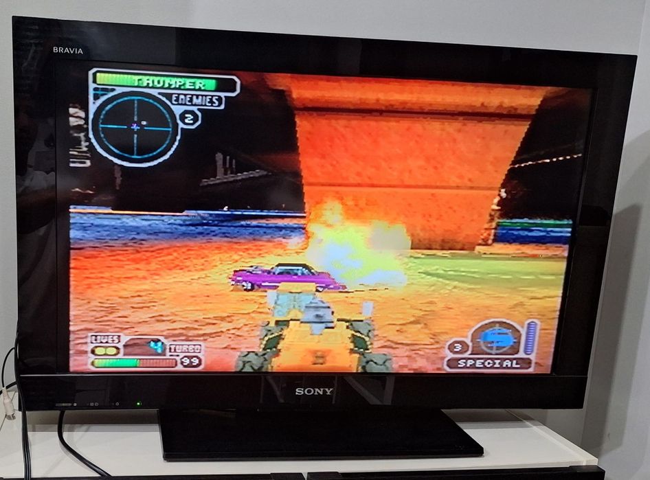 Sony PS1 com película exclusiva.