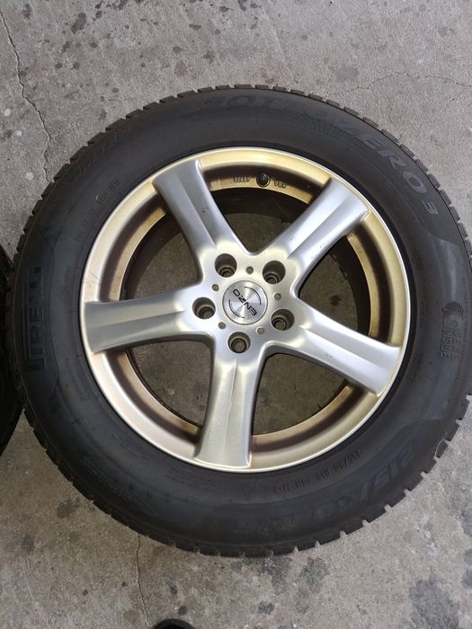 Opony zimowe z felgami 215/60 R16 komplet