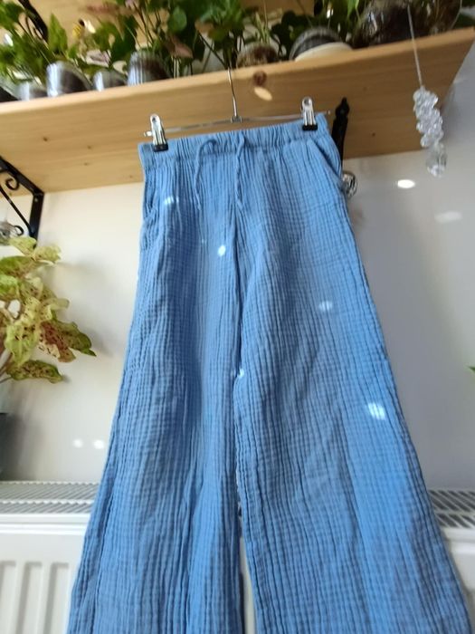 Spodnie luźne muślinowe letnia szerokie dzwony 134