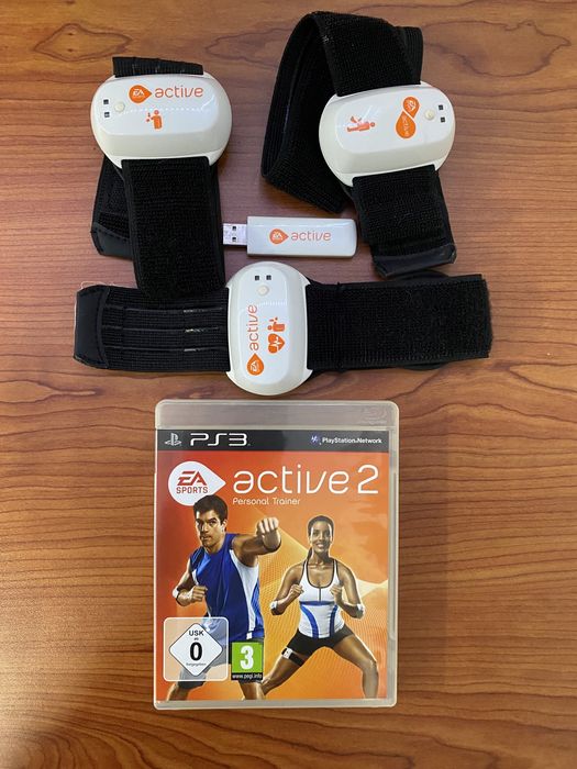 Playstation 3 Slim + 2 comandos + 8 jogos