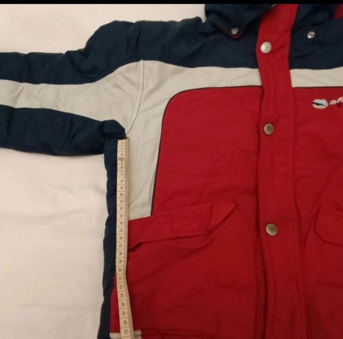 Tanio zimowa ciepła dziecięca kurtka firmy Brugi