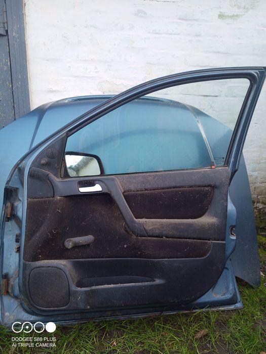 Двері Опель Астра G