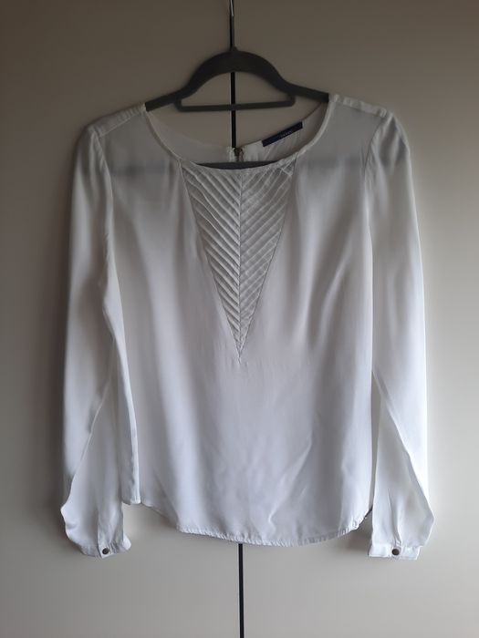 Blusa branca com detalhe no peito da Tiffosi