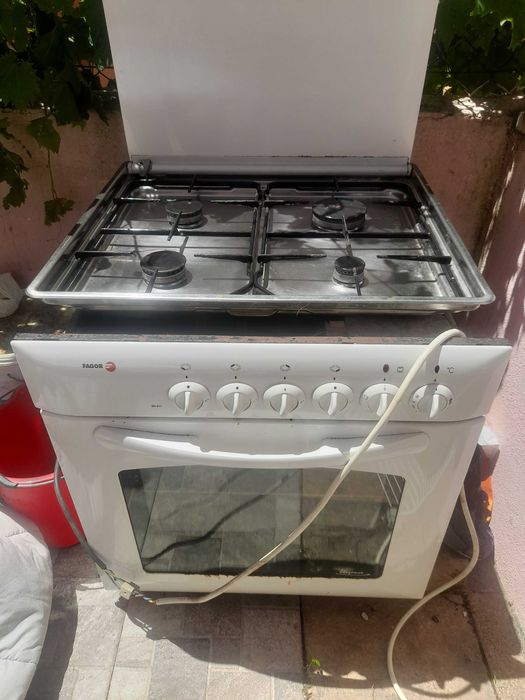 Fogão  looktop com marcas de uso mais funciona perfeitamente