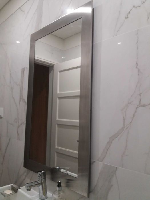 Espelho com moldura em inox64741098274945121