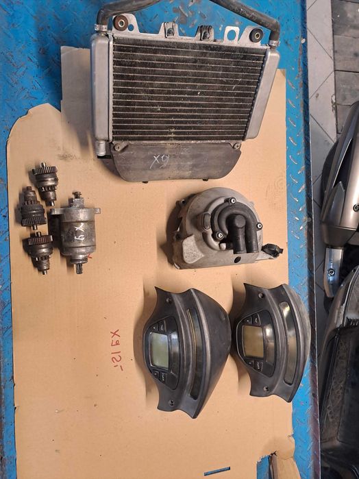 Rama dok. gażniki ,bendix rozrusznik pompa wody zegary wydech  skuter na części Piaggio x9
