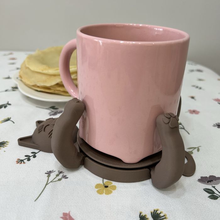 Оригінальна рухлива підставка під чашку кіт