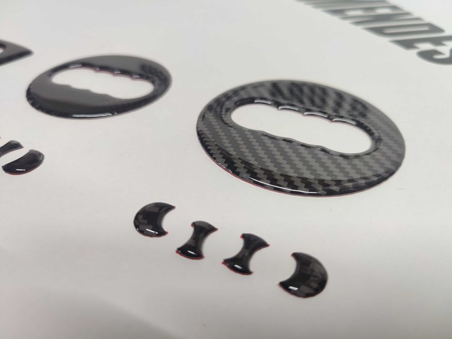 Símbolos do volante tipo carbono