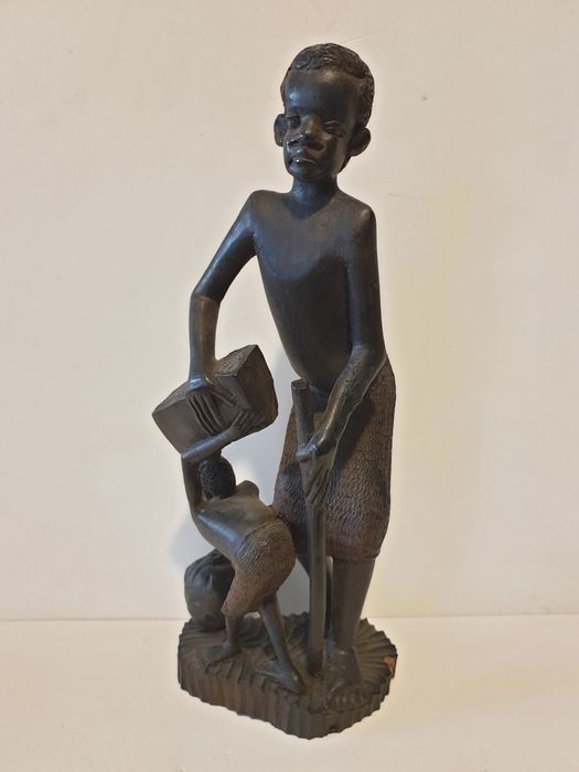 Antiga escultura africana em madeira exótica