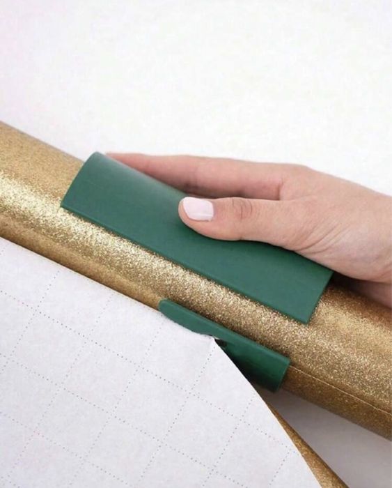 Utensílio para cortar papel de embrulho