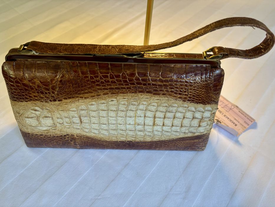 Mala em pele de crocodilo verdadeira