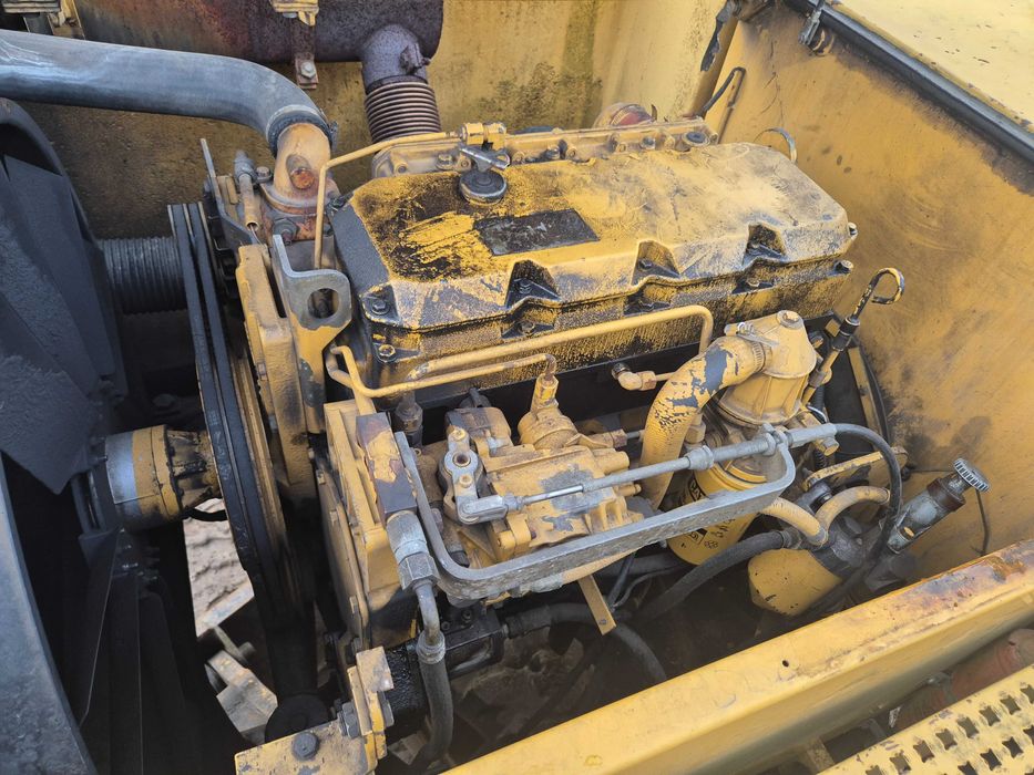 CAT 212 koparka kołowa obrotowa