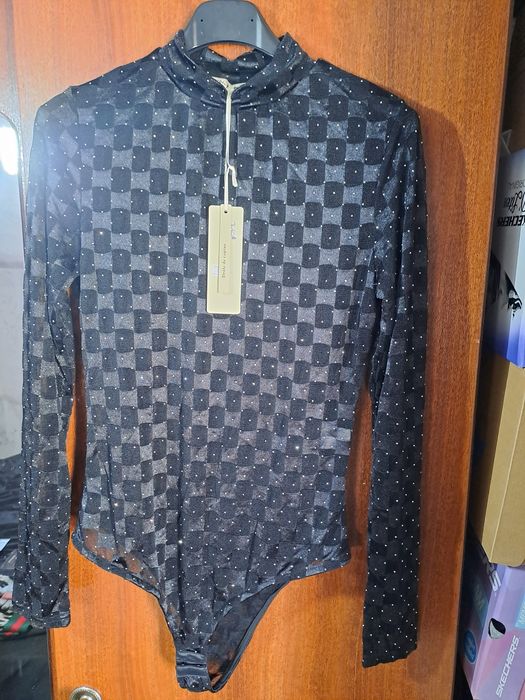 Roupa nova com etiqueta