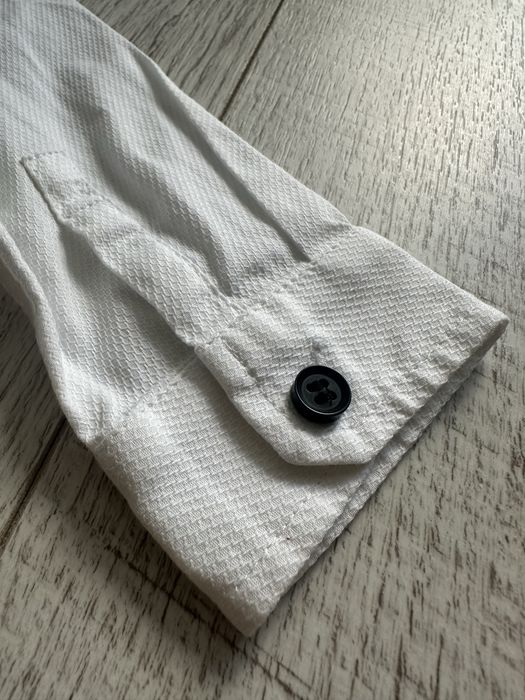 Біла сорочка next