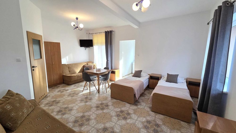 Promocja sierpień, plaża 250 m, centrum 200 m . Pokoje z łazi