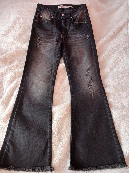 Джинси кльош з потертостями