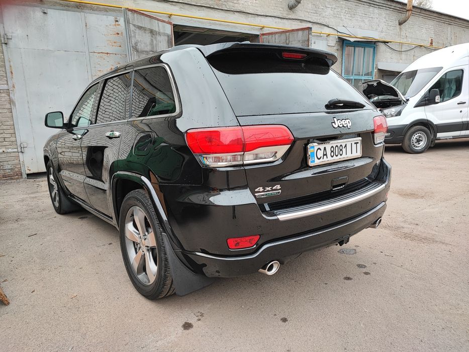 Jeep Grand Cherokee 2015 VIN 1C4RJFCM1FC618540 фото оголошення 4 з 8