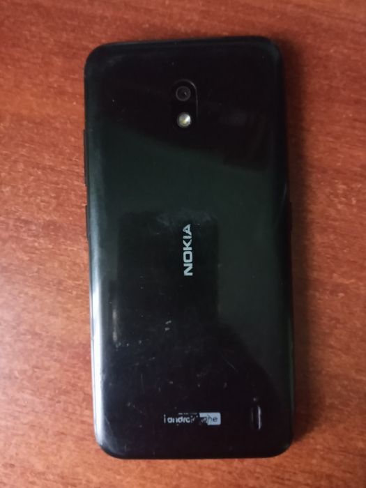 Телефон..сенсорний SONY.