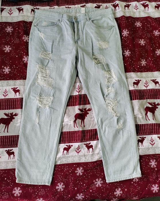 Spodnie jeansowe z przetarciami, r36