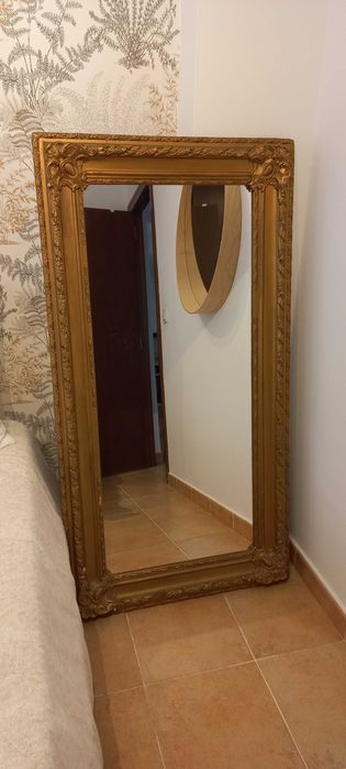 Espelho antigo em talha dourada