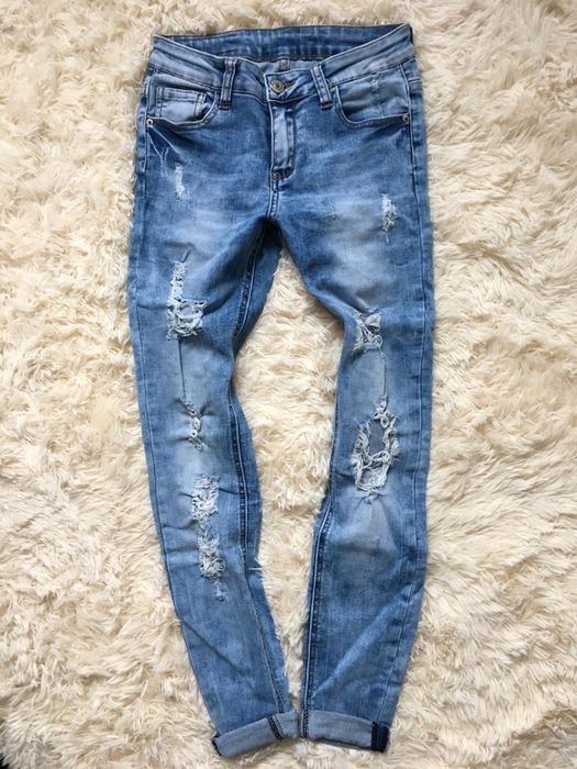 Jeansy z przetarciami xs s