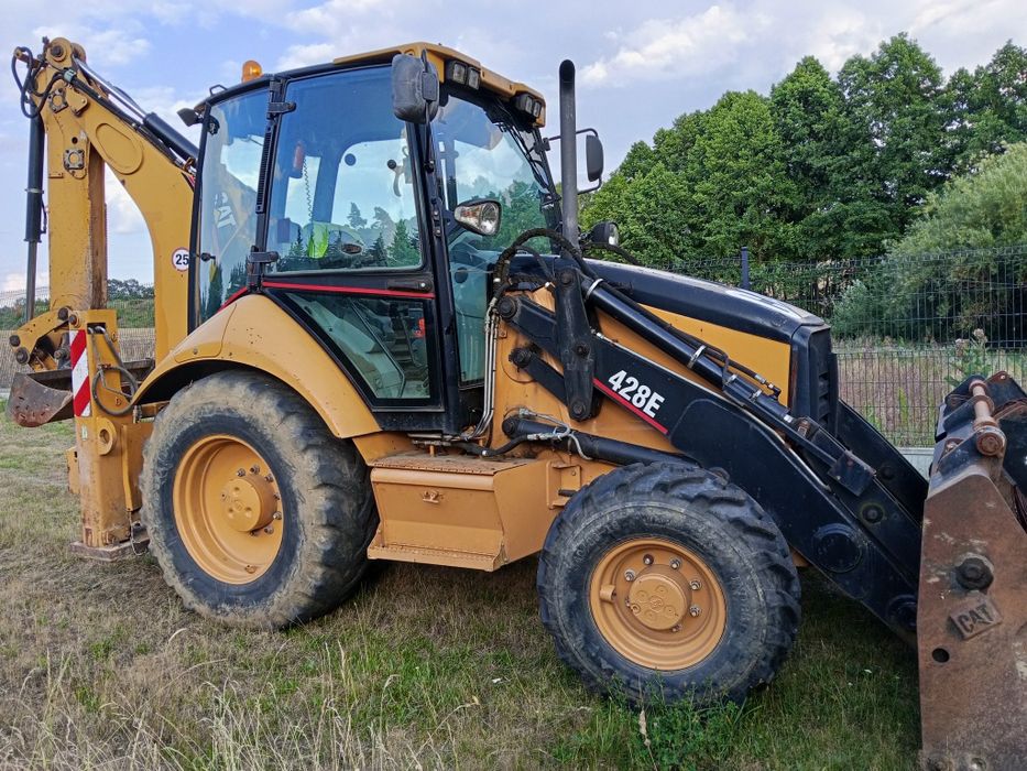 Wynajem koparko ładowarke CAT 428E na doby