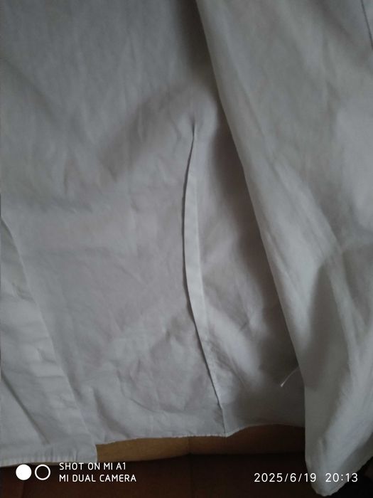 Biała bluzka dla dziewczynki na wzrost 140/146