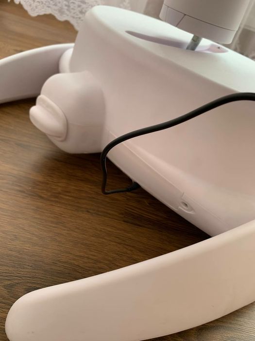 Заколисуюче крісло-гойдалка