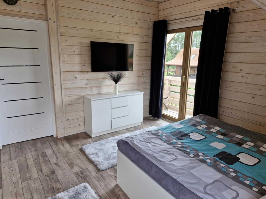 Noclegi domek mazury Mikołajki Mrągowo Krutyń spływy kajakowe jeziorem