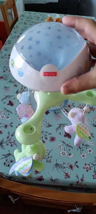 Sistema Fisher-price para berço