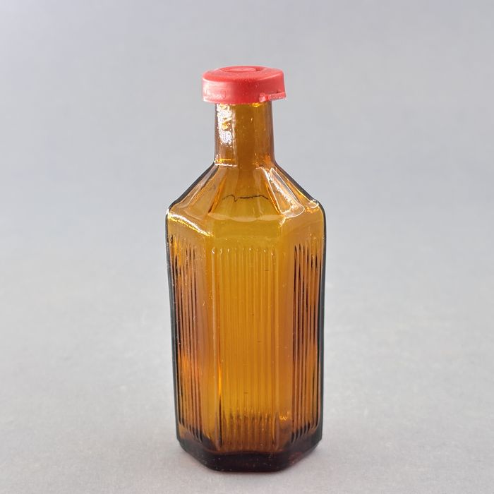 piękna mała miodowa buteleczka butelka po lakach apteczna