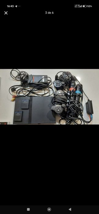 PlayStation 2 com jogos comandos e micros tudo em bom estado