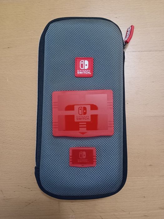 Nintendo Switch Lite + Extras