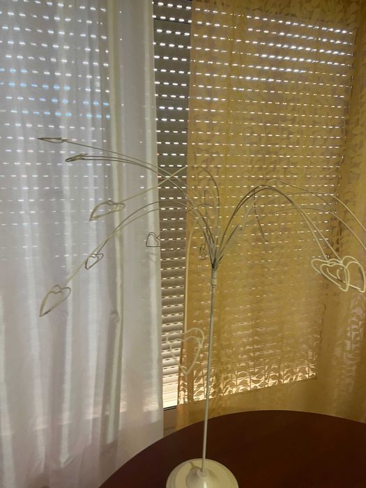 Suporte em metal para fotografias