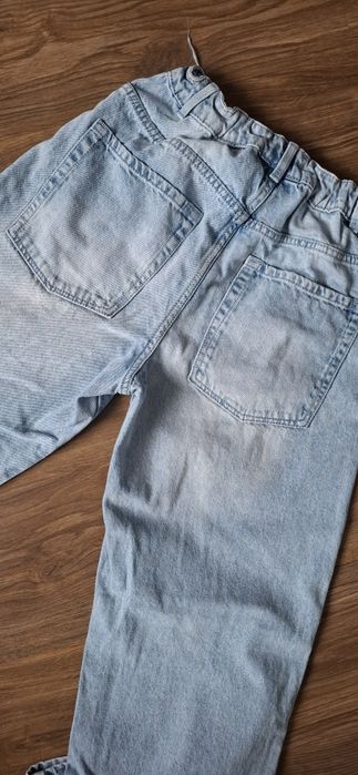 Spodnie jeans 164