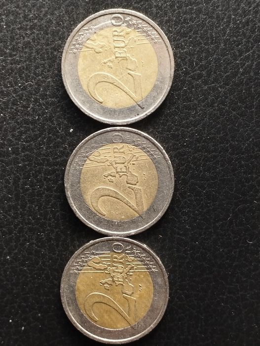 Moedas de 2 euros, Espanha, França e Alemanha.