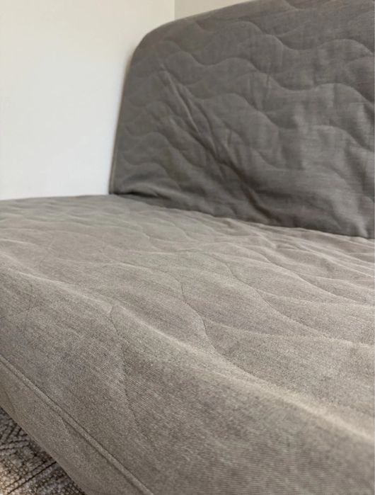 Sofá-cama e capa lavável com colchão de espuma NYHAMN