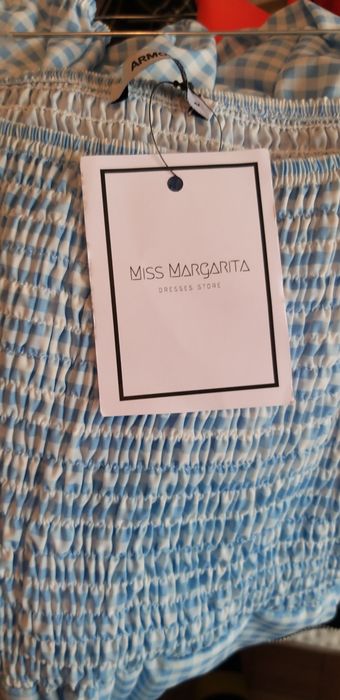 Macacão azul e branco